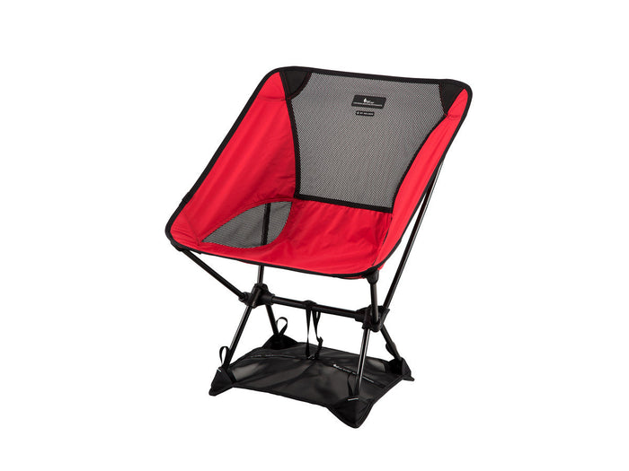 A Helinox x Burton camp chair with ground strap.