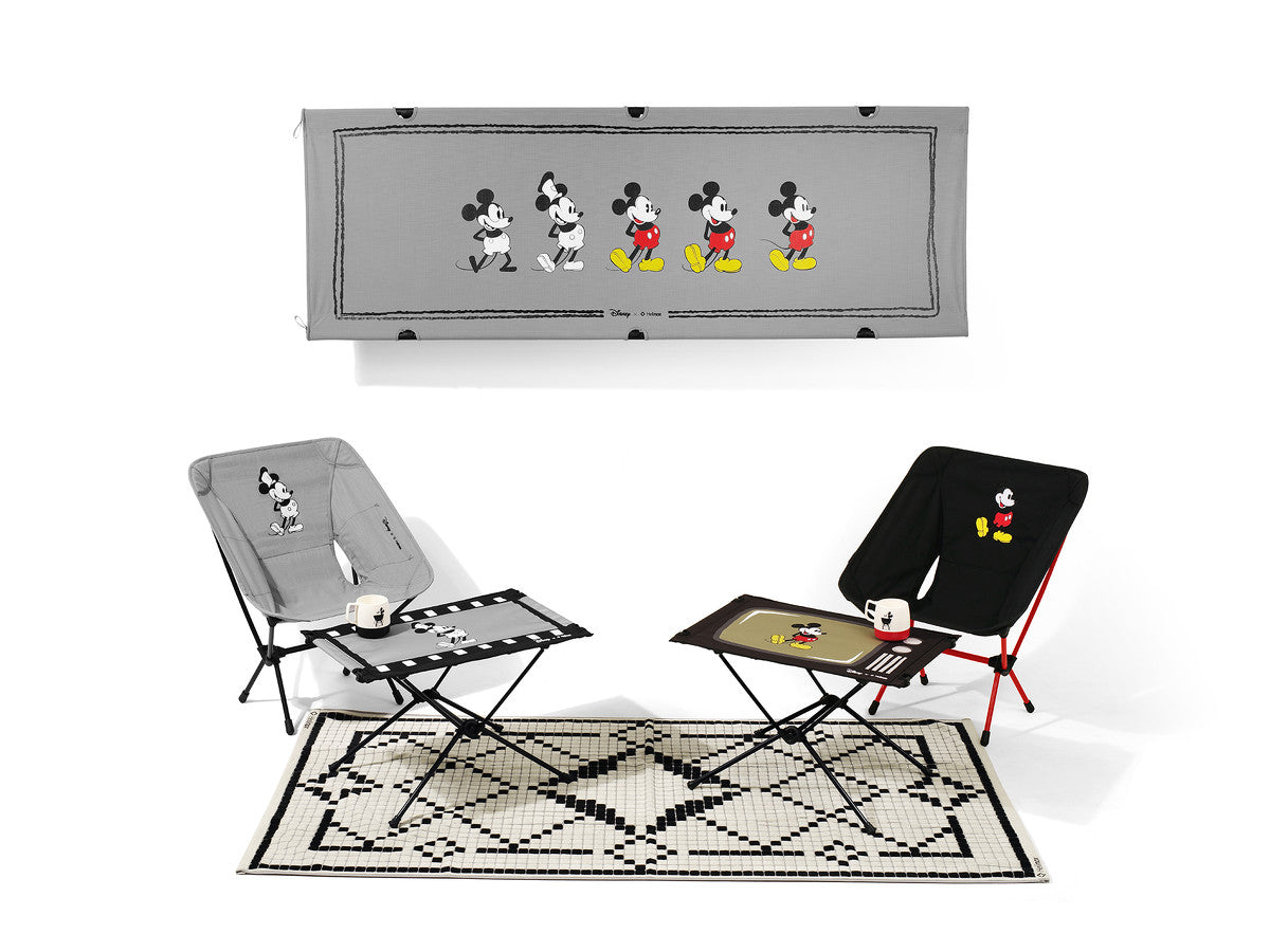Helinox x Disney Mickey Mouse camping set with chairs, tables, cot, and rug