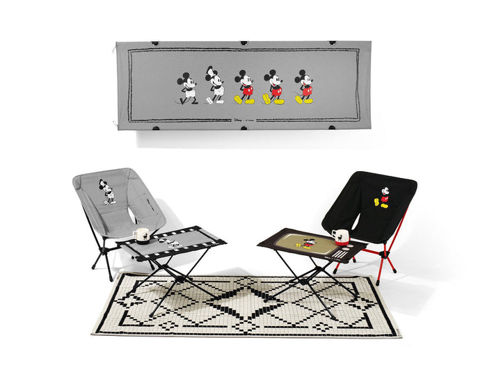 Helinox x Disney Mickey Mouse camping set with chairs, tables, cot, and rug