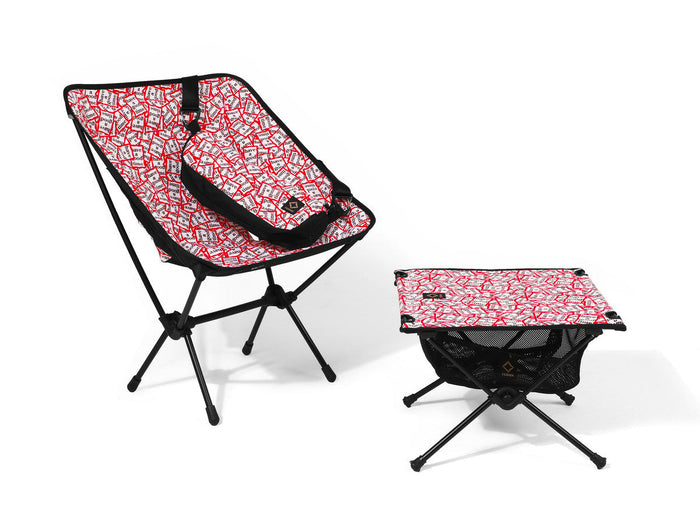 A Helinox x Have A Good Time camp chair and table.